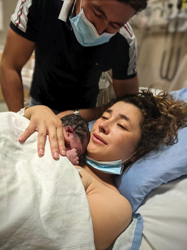 Newborn baby and mother in hospital