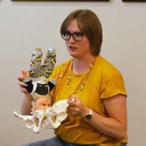 Birthing Instructor with Model Pelvis and Baby